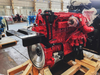 Motor marino con sistema de escape eléctrico de cuatro tiempos