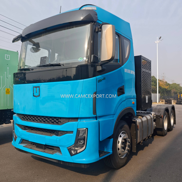Camión tractor G2 azul 6×4 metanol con autonomía extendida y volante a la izquierda