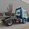 2026 Nuevos modelos que se venden bien Camión tractor con volante a la izquierda 4x2 de techo alto azul cielo y blanco diésel de servicio pesado CAMC